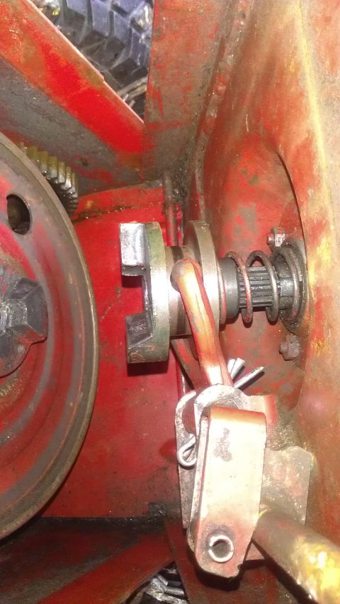 1991 Toyota Tacoma - A close-up view of a mechanical component, possibly from a piece of machinery, showing a pulley and spring mechanism.
