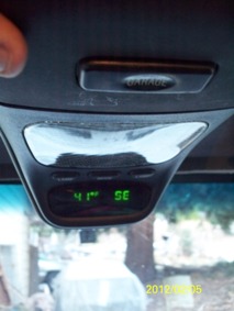 1993 Ford Bronco - Interior view of an overhead console with a digital display showing the temperature and another reading.