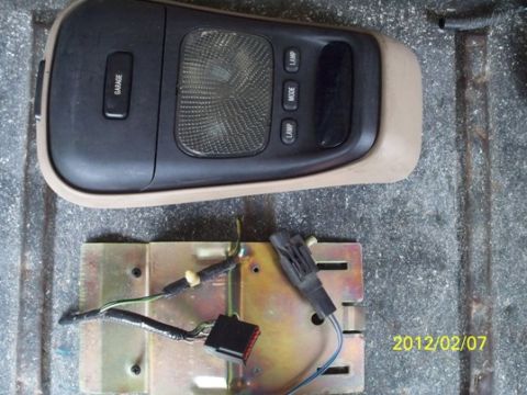 1993 Ford Bronco - Overhead console light and control panel with associated wiring and mounting bracket.