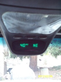 1993 Ford Bronco - The digital display in the overhead console shows the interior temperature as 40 degrees and the direction as NE.