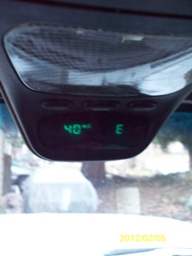 1993 Ford Bronco - The overhead console displays the temperature and a directional indicator.