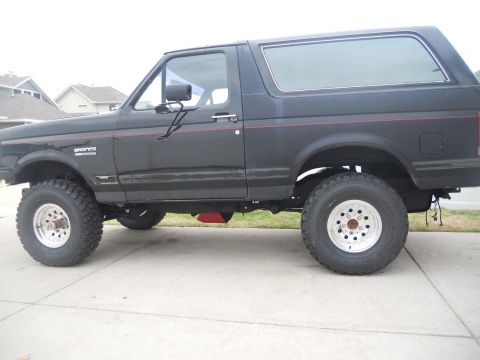 1991 Ford Bronco - This 1991 Ford Bronco is shown with a lifted suspension and large off-road tires.