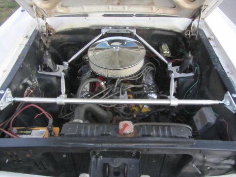 1964 Ford Ranchero - 1964 Ford Ranchero engine bay with aftermarket bracing installed.