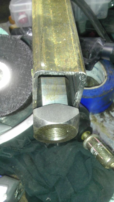 1987 Ford Ranger - Close-up of a metal component with threaded connections, likely a suspension part.