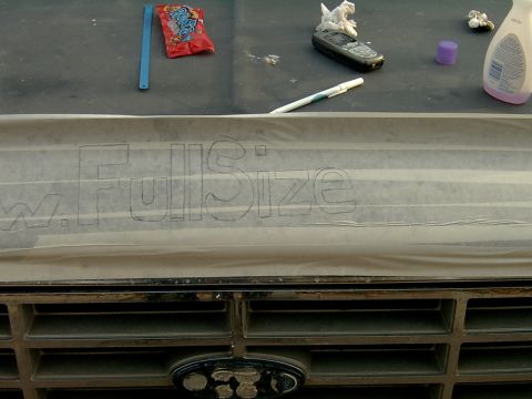 1982 Ford Bronco - A Ford Bronco grille is visible, with "FullSize" text drawn on tape over the hood.