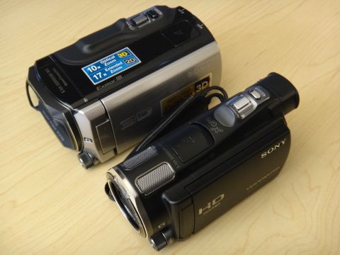 1993 Ford Taurus - Two Sony camcorders are shown on a wooden table.