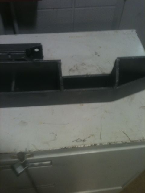 1993 Ford Bronco - A metal bracket is shown, possibly for automotive use.