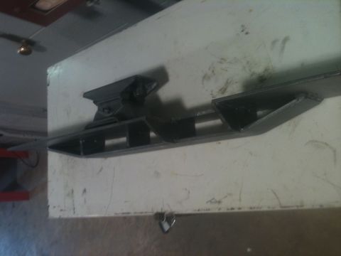 1993 Ford Bronco - A metal component, possibly a bracket or frame piece, is shown in detail.