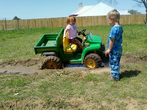 1989 Ford Bronco - Kids enjoy playing in a toy Gator that got stuck in the mud.