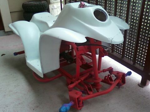 1989 Ford Bronco - This is a partial view of an ATV, showing its frame and body panels, not a 1989 Ford Bronco.