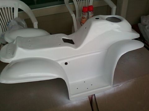 1989 Ford Bronco - Unidentified white plastic body panel, likely a replacement part, is shown in detail.