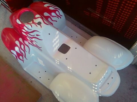 1989 Ford Bronco - This is a white ATV body with custom red flame graphics. The registry claims it is a 1989 Ford Bronco, which is incorrect.