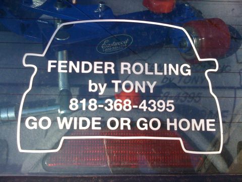 1964 Ford Ranchero - Car window sticker advertises fender rolling services with a phone number and slogan.