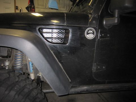 2008 Jeep Wrangler - The "JK" badge on this Jeep Wrangler indicates a model year of 2007 or later, not 2008 as claimed.