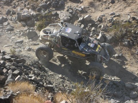 1996 Ford Bronco - This custom off-road buggy navigates a challenging rocky trail.
