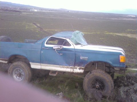 1989 Ford Bronco - This 1989 Ford Bronco sustained significant damage to its roof and windshield while off-roading.