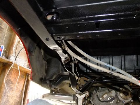 1995 Ford Bronco - The underside of a vehicle, showing the frame and fuel lines after detailing. The registry claims it is a 1995 Ford Bronco, but this is not…