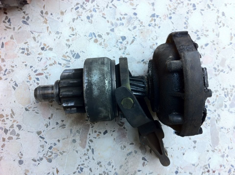 Starter motor part with gear and housing