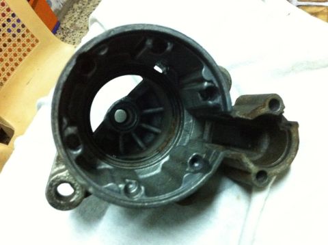1998 Ford Crown Victoria - Close-up of a disassembled starter motor housing, showing internal components.