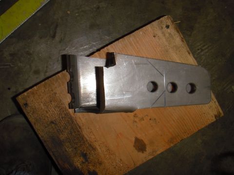 1995 Ford Bronco - Fabricated metal bracket with scribe lines and mounting holes.