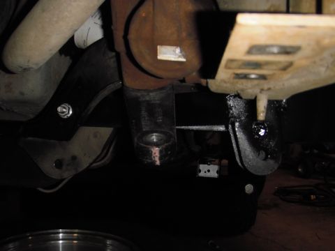 1995 Ford Bronco - Undercarriage view showing suspension parts and exhaust system, with a SuperMotors watermark.