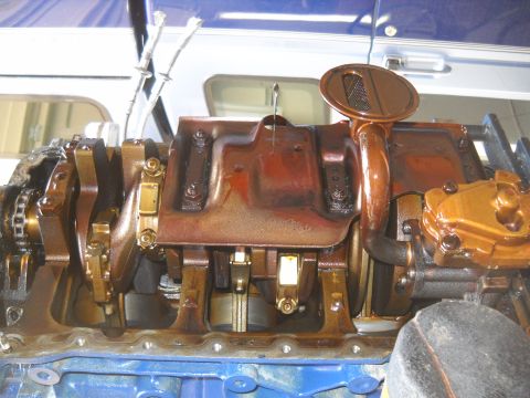 1992 Ford Explorer - The internal workings of an engine's oil pan and crankshaft are visible in this close-up shot.