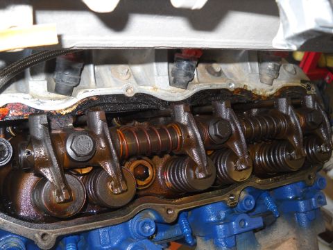 1992 Ford Explorer - Internal view of an engine's valve train, showing rocker arms and springs. The registry claims this is from a 1992 Ford Explorer, but the i…