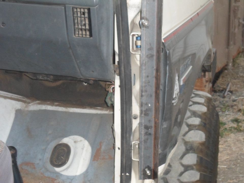 1991 Ford Bronco interior door frame, dashboard vent, and tire tread