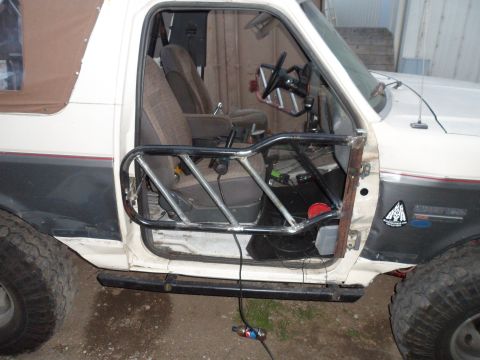 1991 Ford Bronco - Custom door cage installed in a 1991 Ford Bronco interior.
