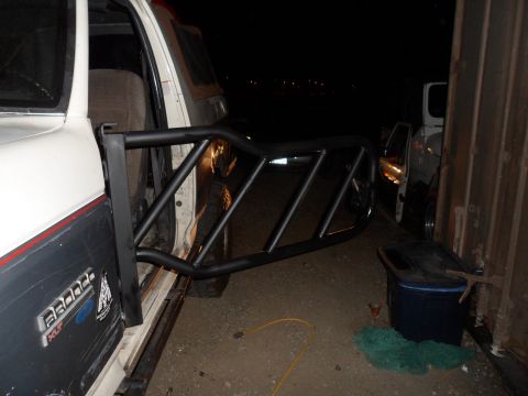 1991 Ford Bronco - Custom tube door cage mounted on the driver's side of a 1991 Ford Bronco.
