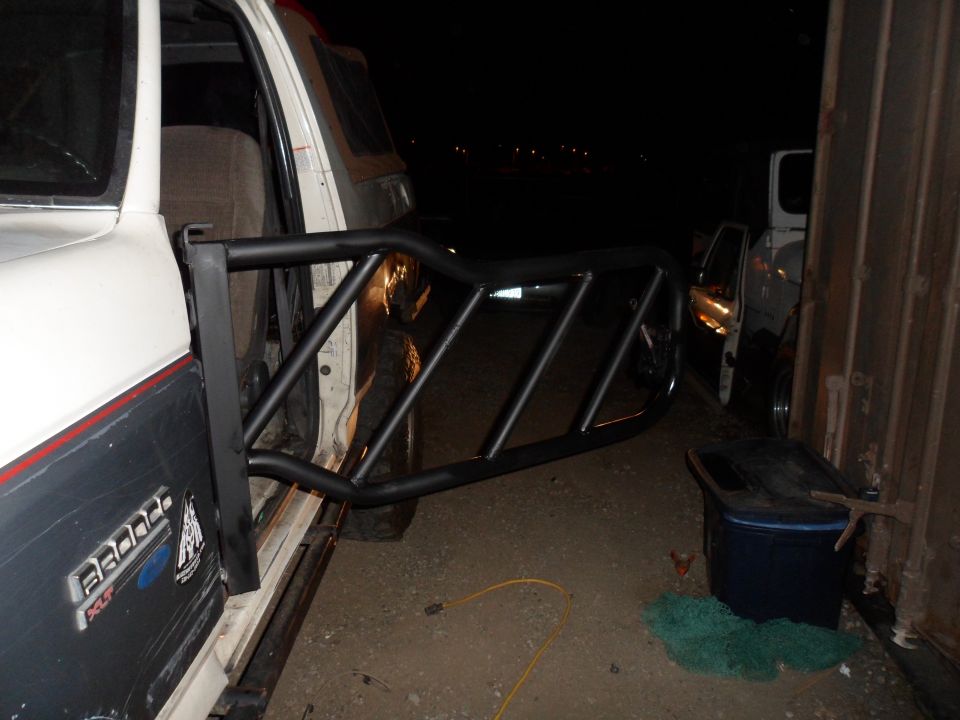 1991 Ford Bronco with custom tube door cage installed on driver's side