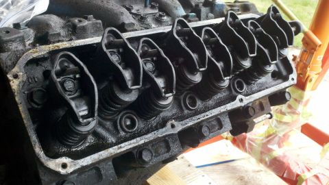 1978 Ford Bronco - Close-up view of an engine's valve train, showing rocker arms and springs.