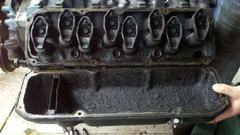 1978 Ford Bronco - Engine valve train components exposed after removing the valve cover during a motor rebuild.