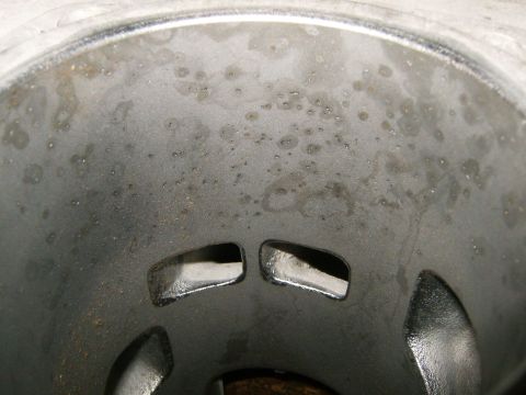 2000 Ford E350 - Close-up view of an engine cylinder bore, showing wear and two intake/exhaust ports.