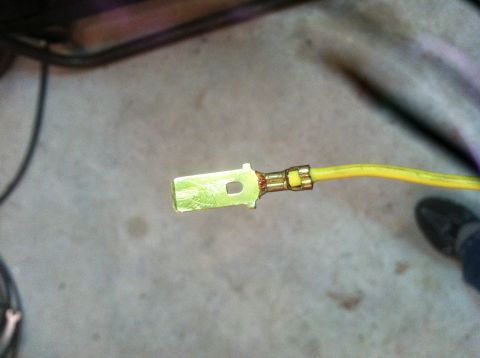 1989 Ford Bronco - Electrical connector attached to a yellow wire, likely for automotive repair or modification.