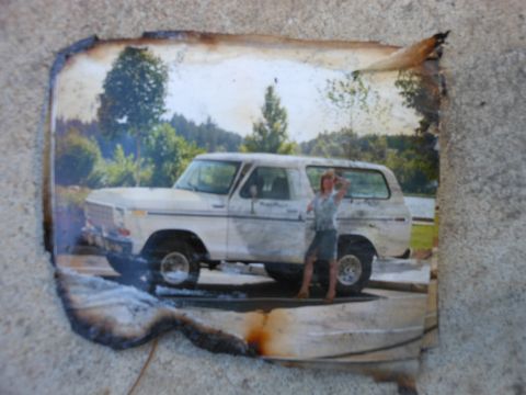 1978 Ford F-250 - A woman poses next to a weathered white Ford Bronco.
