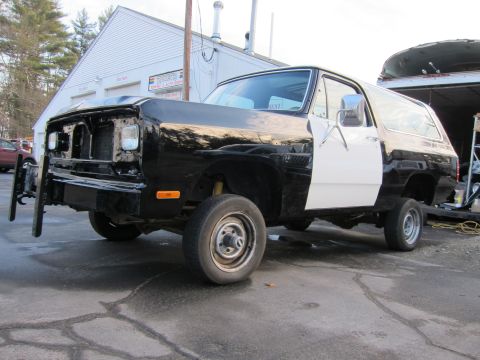 1987 Dodge 1500 - This Dodge Ramcharger appears to be undergoing repairs or restoration, with its front end partially disassembled.
