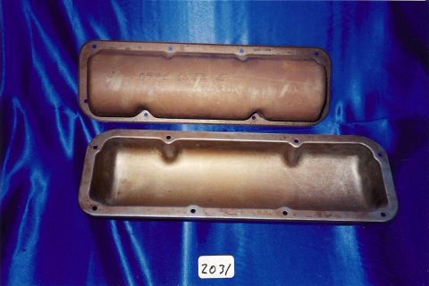 1973 Ford Mustang - A pair of used valve covers are displayed against a blue fabric backdrop.