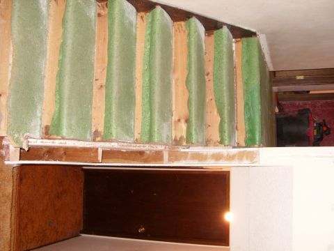 1988 Ford Bronco - Construction detail showing wood framing and green insulation panels.