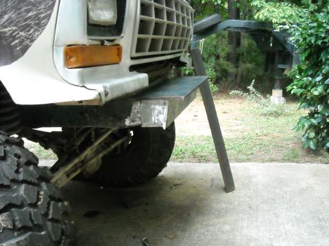 1979 Ford F-150 - The front end of a 1979 Ford F-150 shows a modified bumper with added metal plating.