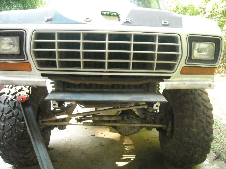 1979 Ford F-150 front grille, headlights, and large off-road tires