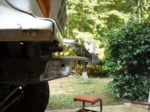 1979 Ford F-150 - The front bumper of a truck is shown with evidence of recent metal repair and welding.