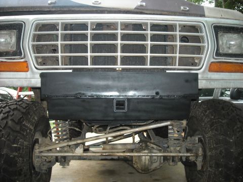1979 Ford F-150 - Front view of a 1979 Ford F-150, highlighting its grille, bumper, and off-road tires.
