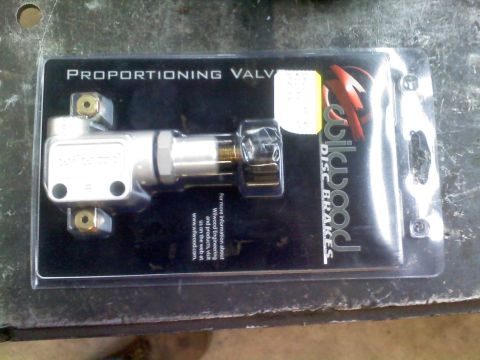 1996 Ford Bronco - A proportioning valve for disc brakes is shown in its retail packaging.