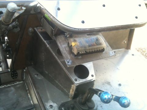 1966 Ford Bronco - Interior view of a custom buggy, showing exposed metalwork, a fuse box, and shifter mechanism.