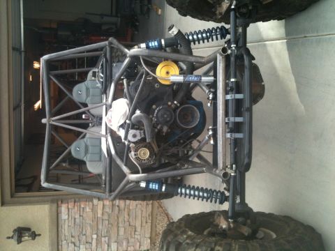 1966 Ford Bronco - Custom off-road buggy chassis with engine and suspension visible, viewed from above.