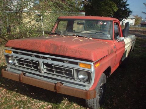 1993 Ford Bronco - This pickup truck appears to be from the 1970s, not a 1993 Ford Bronco.