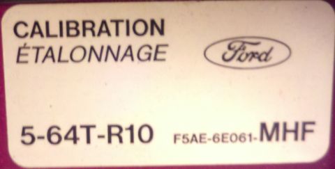 1995 Ford Bronco - Ford calibration sticker shows part numbers and the Ford logo.