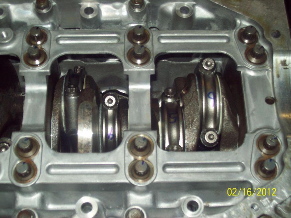 Engine block bottom end with connecting rod big ends and numbered rod caps