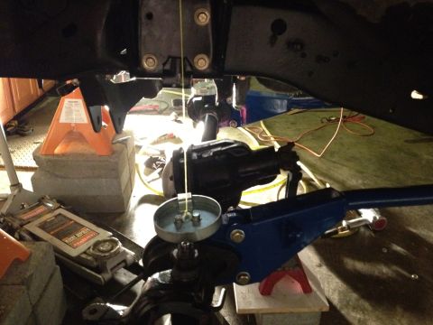 1995 Ford Bronco - Underneath view of vehicle suspension and differential work in progress.